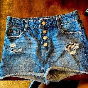 Faded blue four button jean shorts